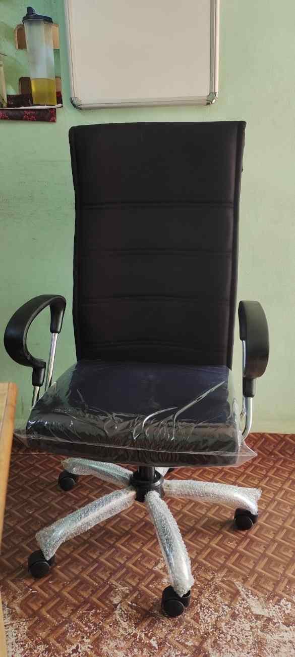 Office chairs in a real workplace setting